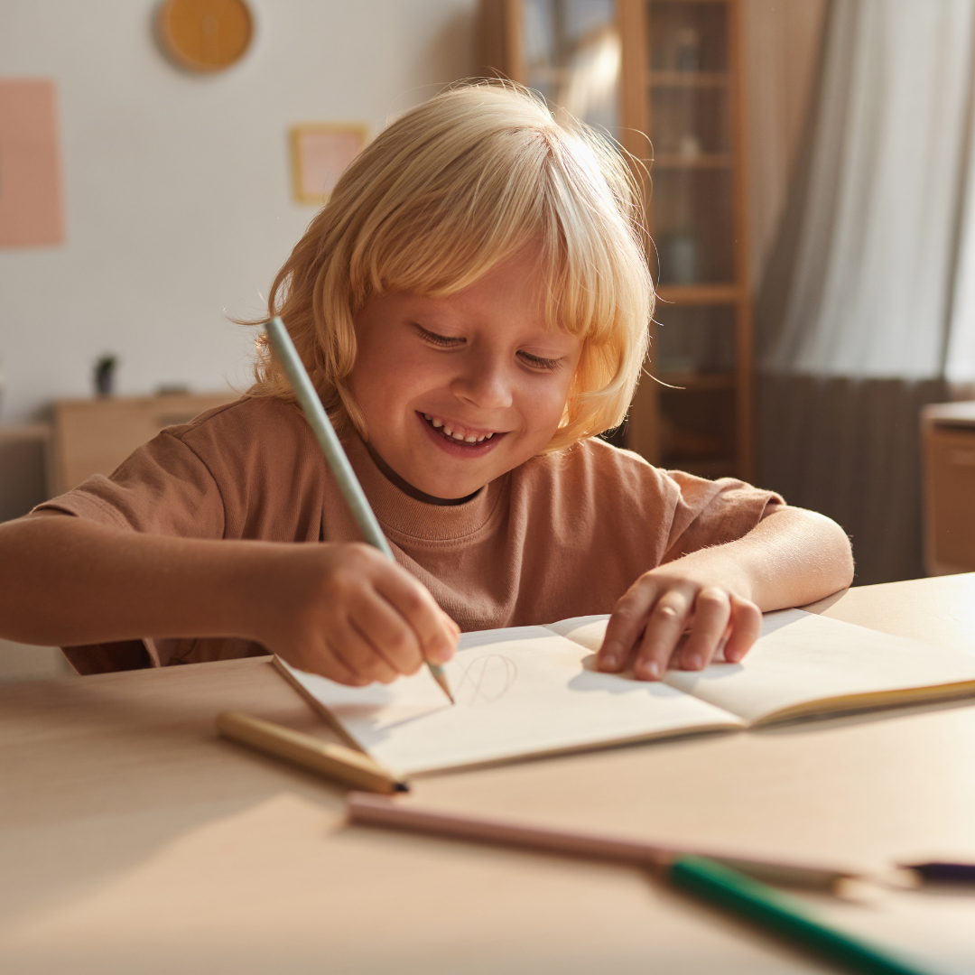 Boy writing down