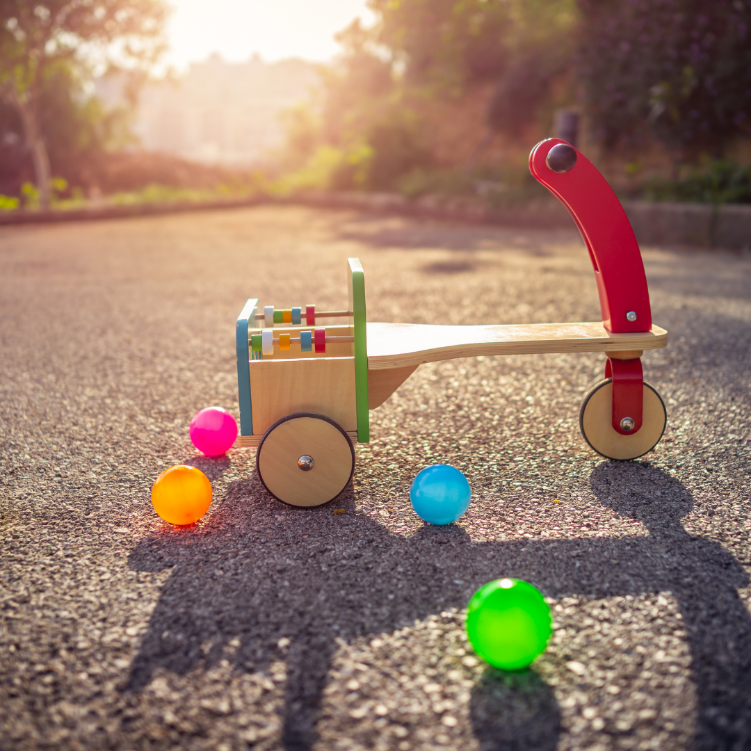 tricycle and soft balls in playground